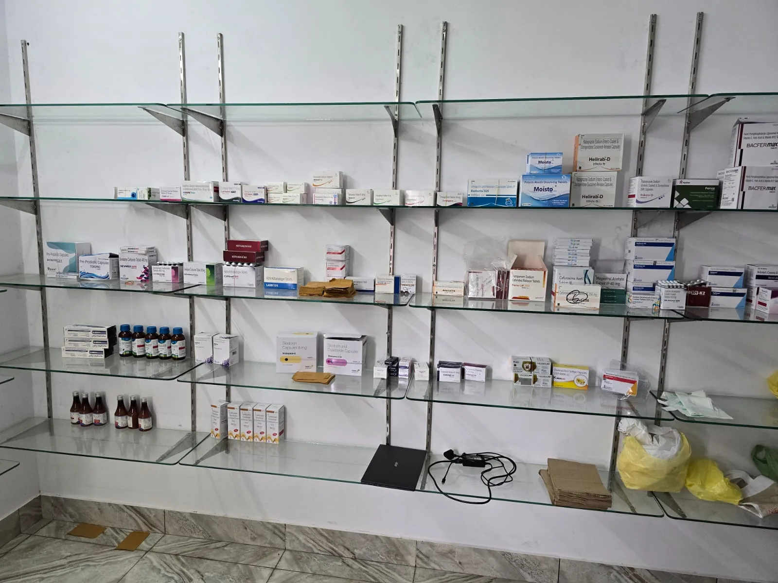 Kidney Care Pharmacy shelves at Gandhi Nagar clinic